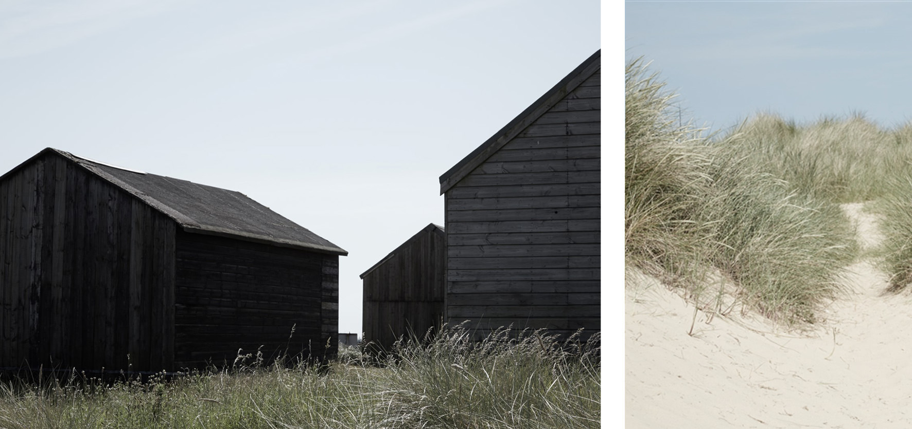Beautiful Norfolk sandy beach with dunes and black Fishermans huts.