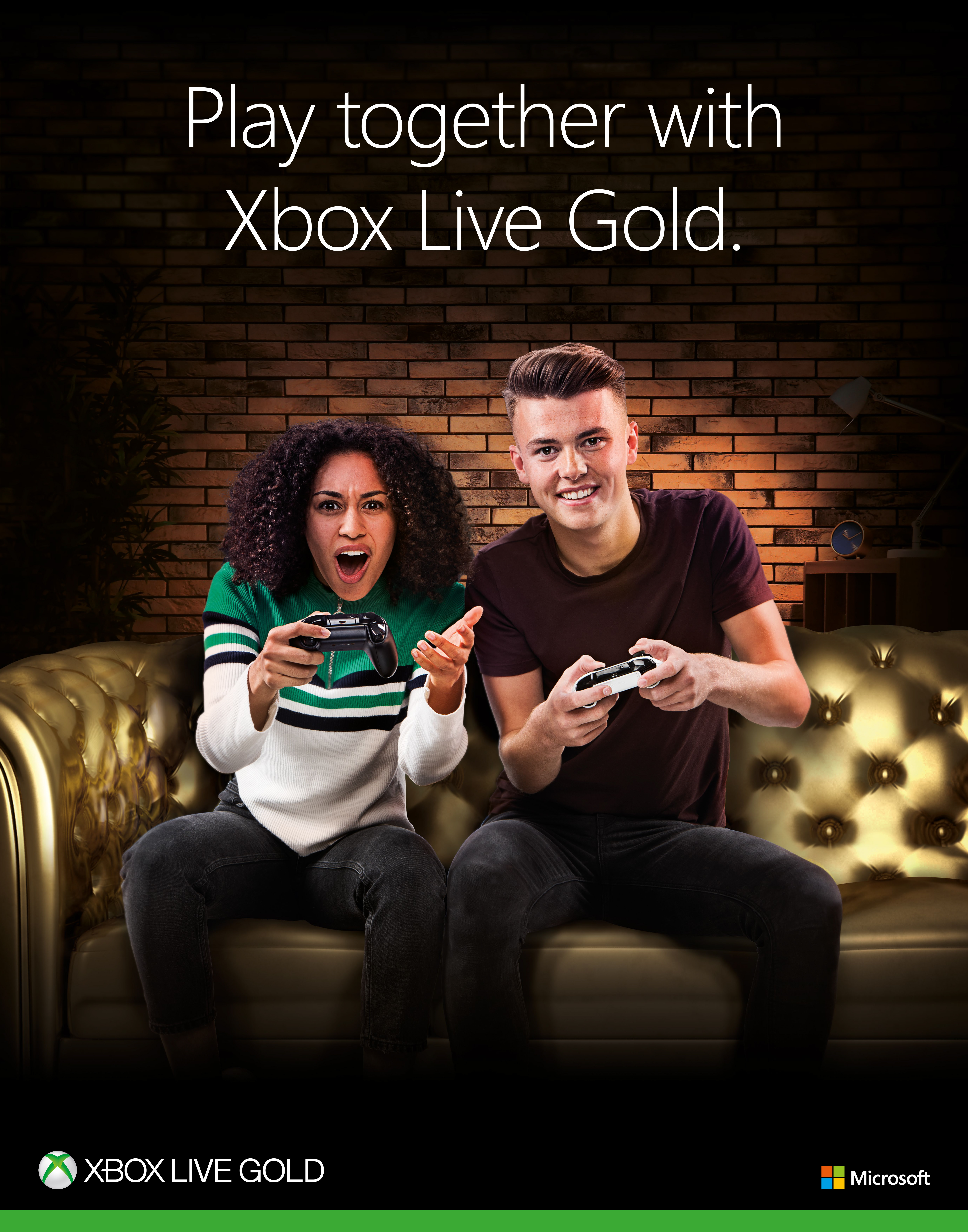Annabella King and Joe Pemberton posing with an Xbox remote for Xbox Live Campaign with Sandra Reynolds